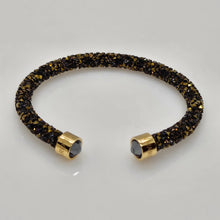 Lade das Bild in den Galerie-Viewer, SWAROVSKI Crystaldust Armreif Größe S Dark Gold 5372883 oU