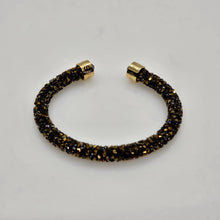 Lade das Bild in den Galerie-Viewer, SWAROVSKI Crystaldust Armreif Größe S Dark Gold 5372883
