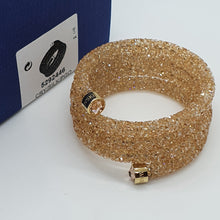 Lade das Bild in den Galerie-Viewer, SWAROVSKI Crystaldust Triple Armreif Größe S Gold 5292446