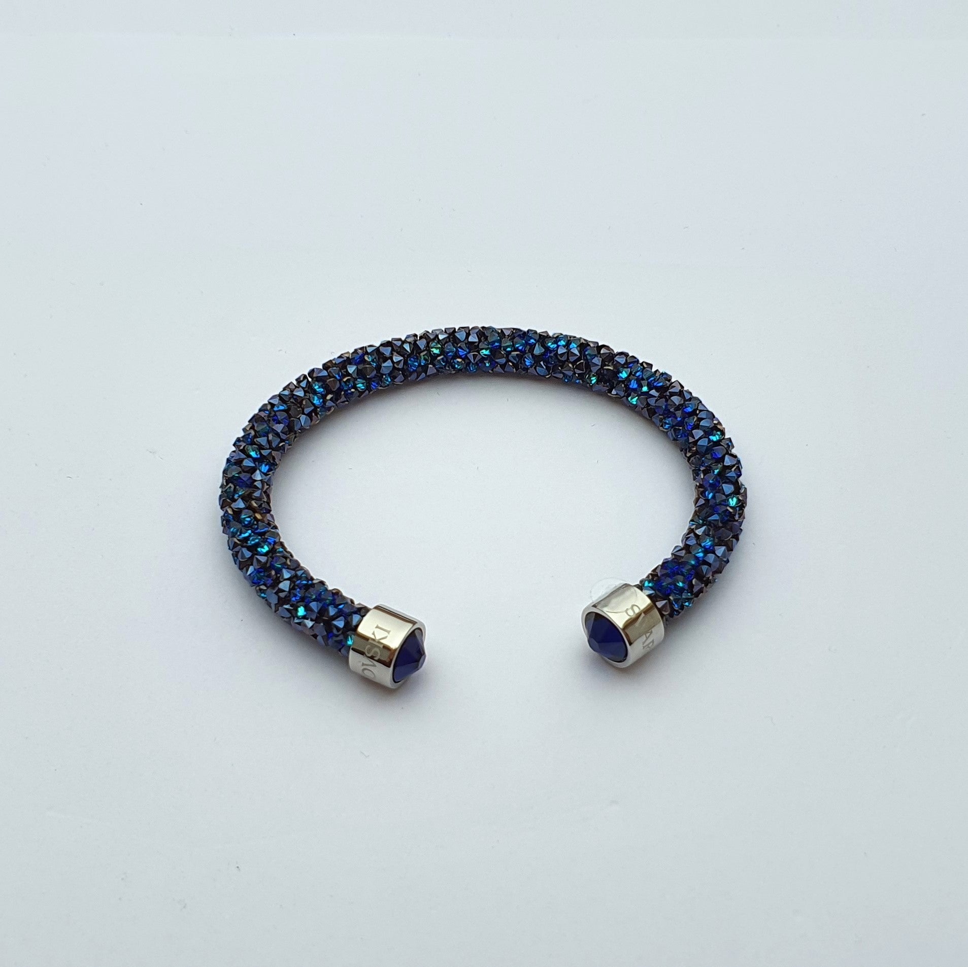 SWAROVSKI Crystaldust Armreif Größe M Blau 5250068