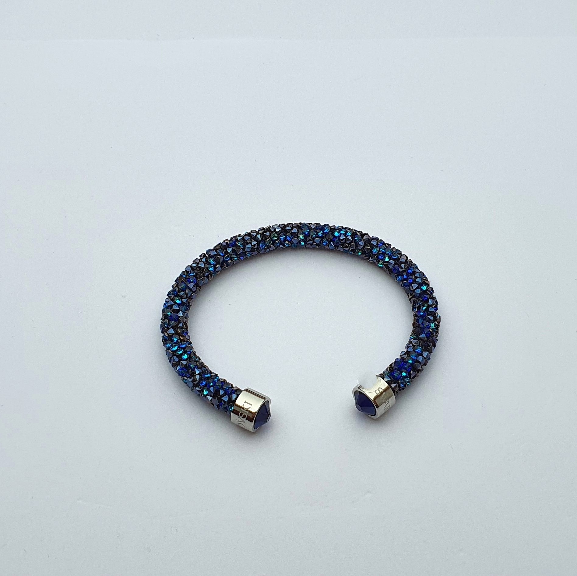 SWAROVSKI Crystaldust Armreif Größe M Blau 5250068