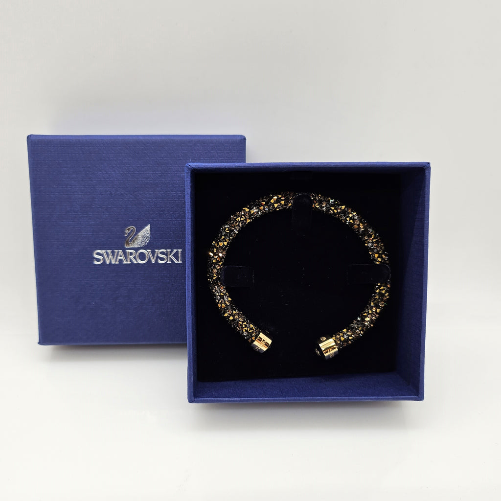 SWAROVSKI Crystaldust Armreif Größe S Dark Gold 5372883 oU
