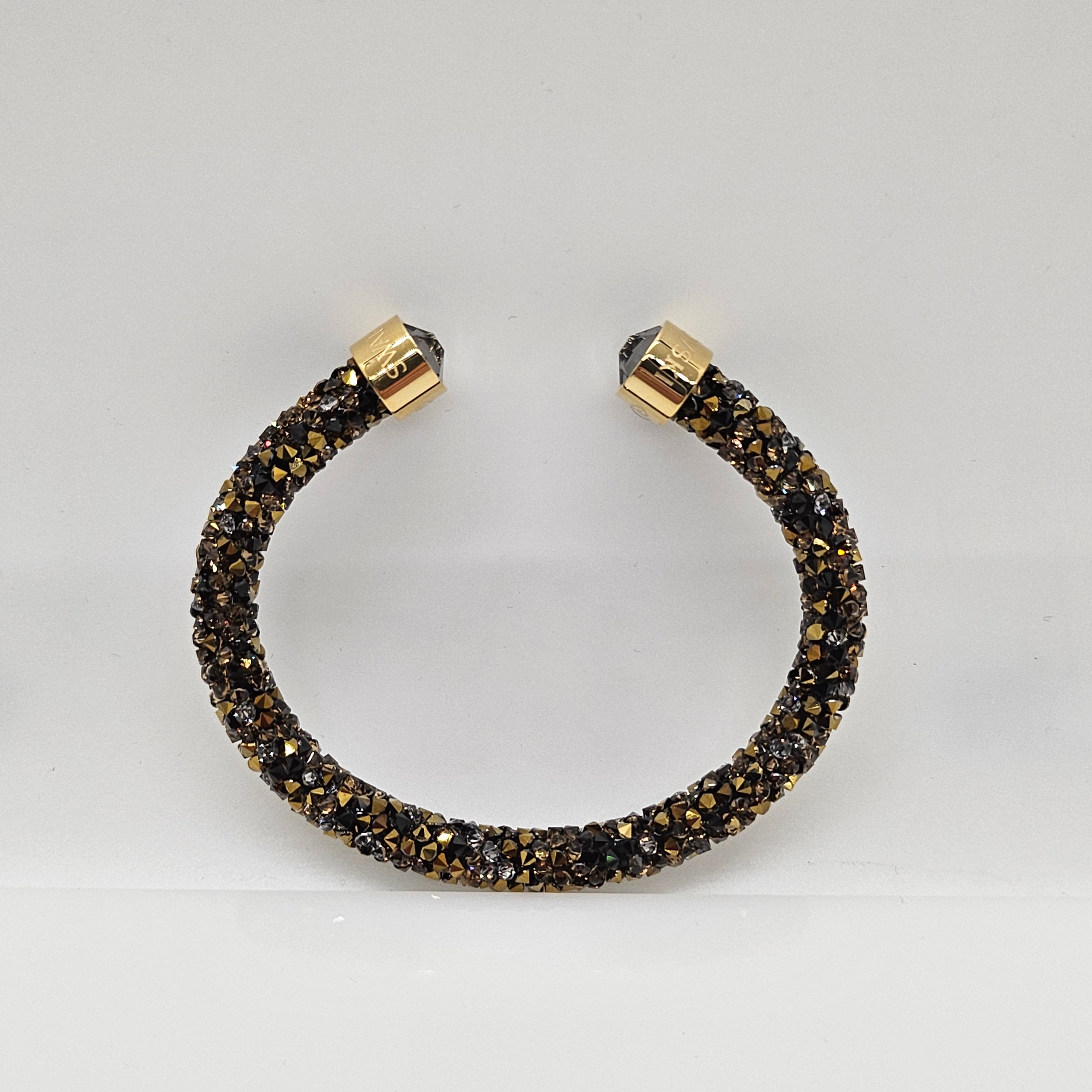 SWAROVSKI Crystaldust Armreif Größe S Dark Gold 5372883