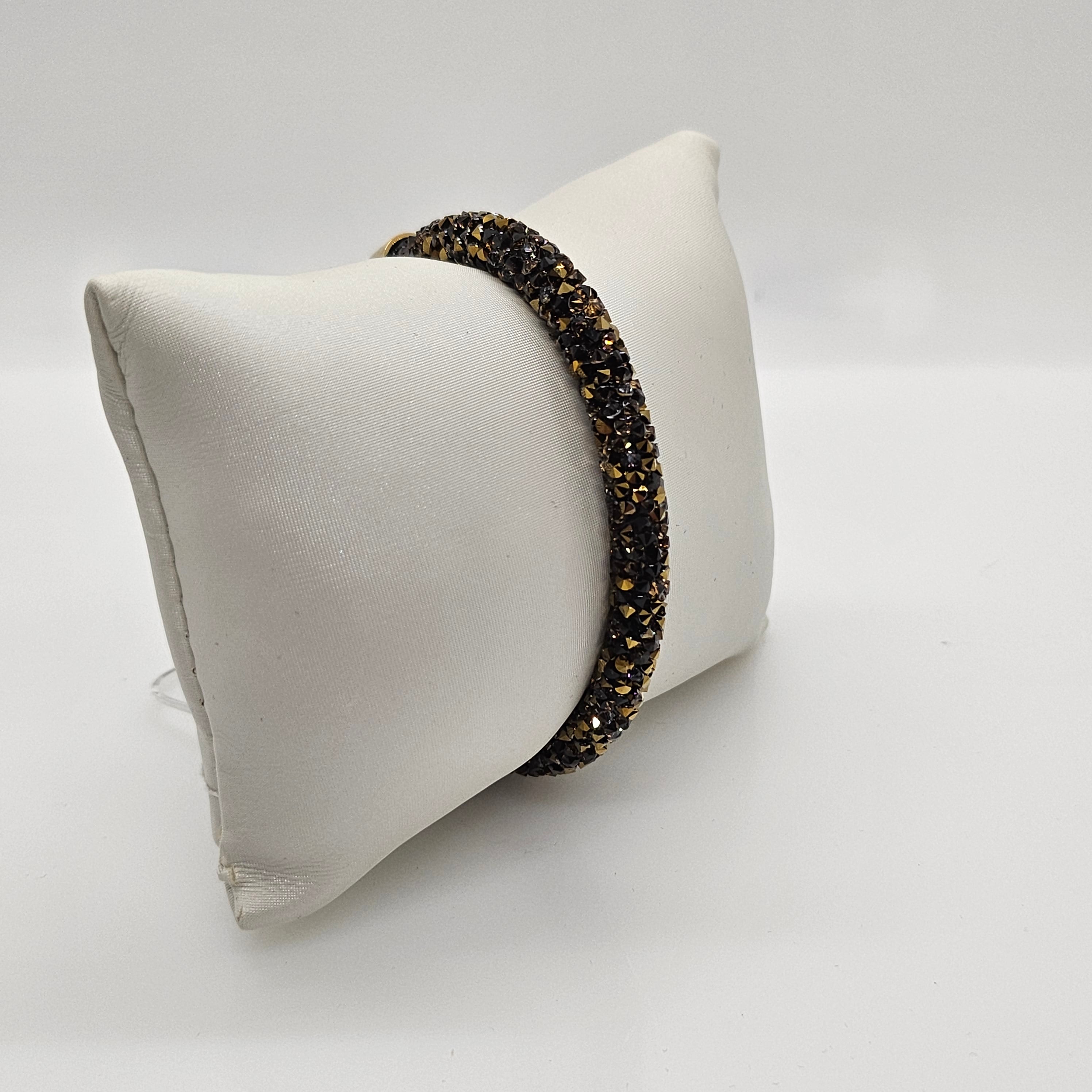 SWAROVSKI Crystaldust Armreif Größe S Dark Gold 5372883