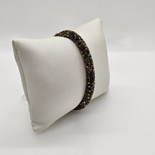 Lade das Bild in den Galerie-Viewer, SWAROVSKI Crystaldust Armreif Größe S Dark Gold 5372883
