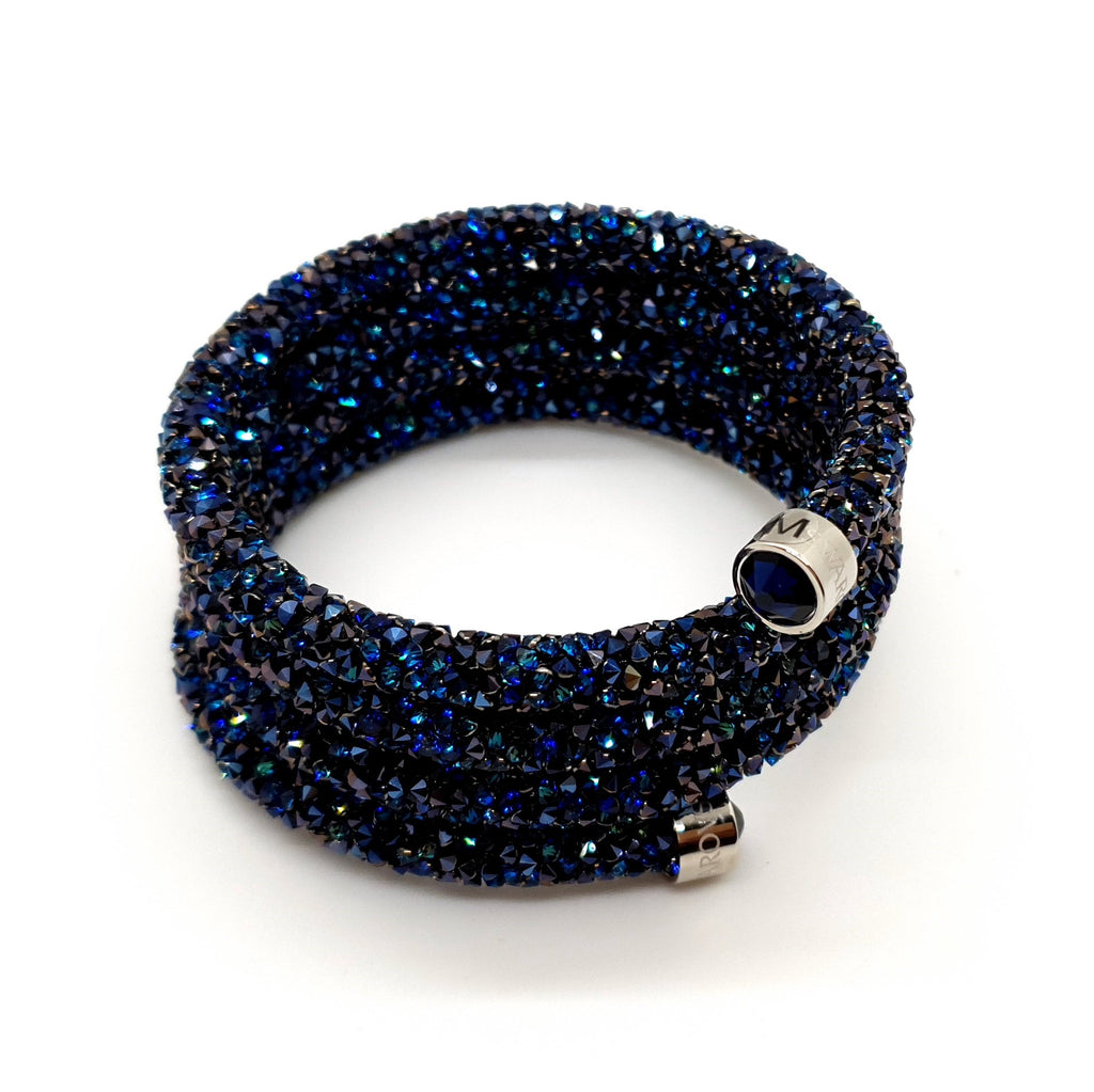 SWAROVSKI Crystaldust Triple Armreif Größe M Blau 5294804