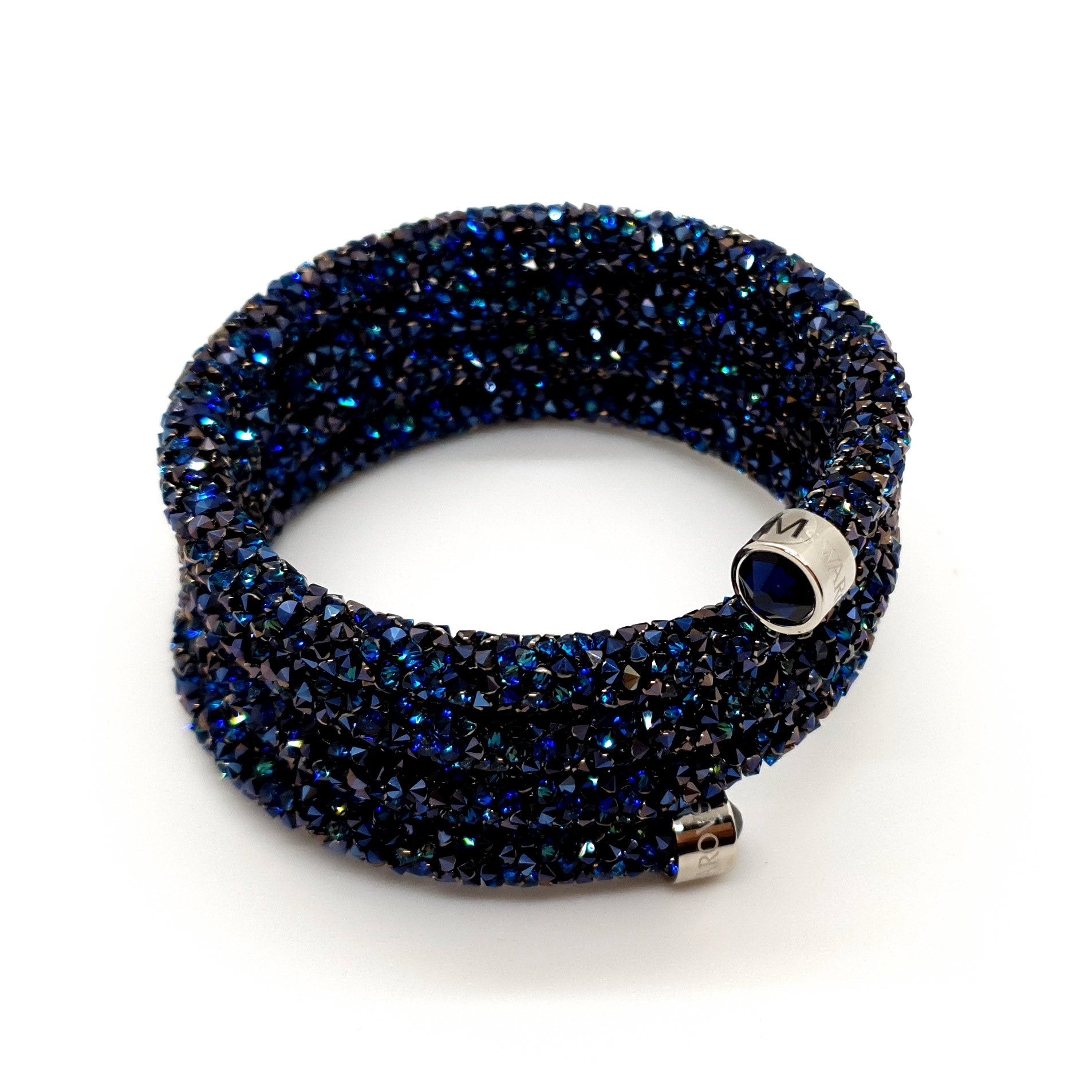 SWAROVSKI Crystaldust Triple Armreif Größe M Blau 5294804