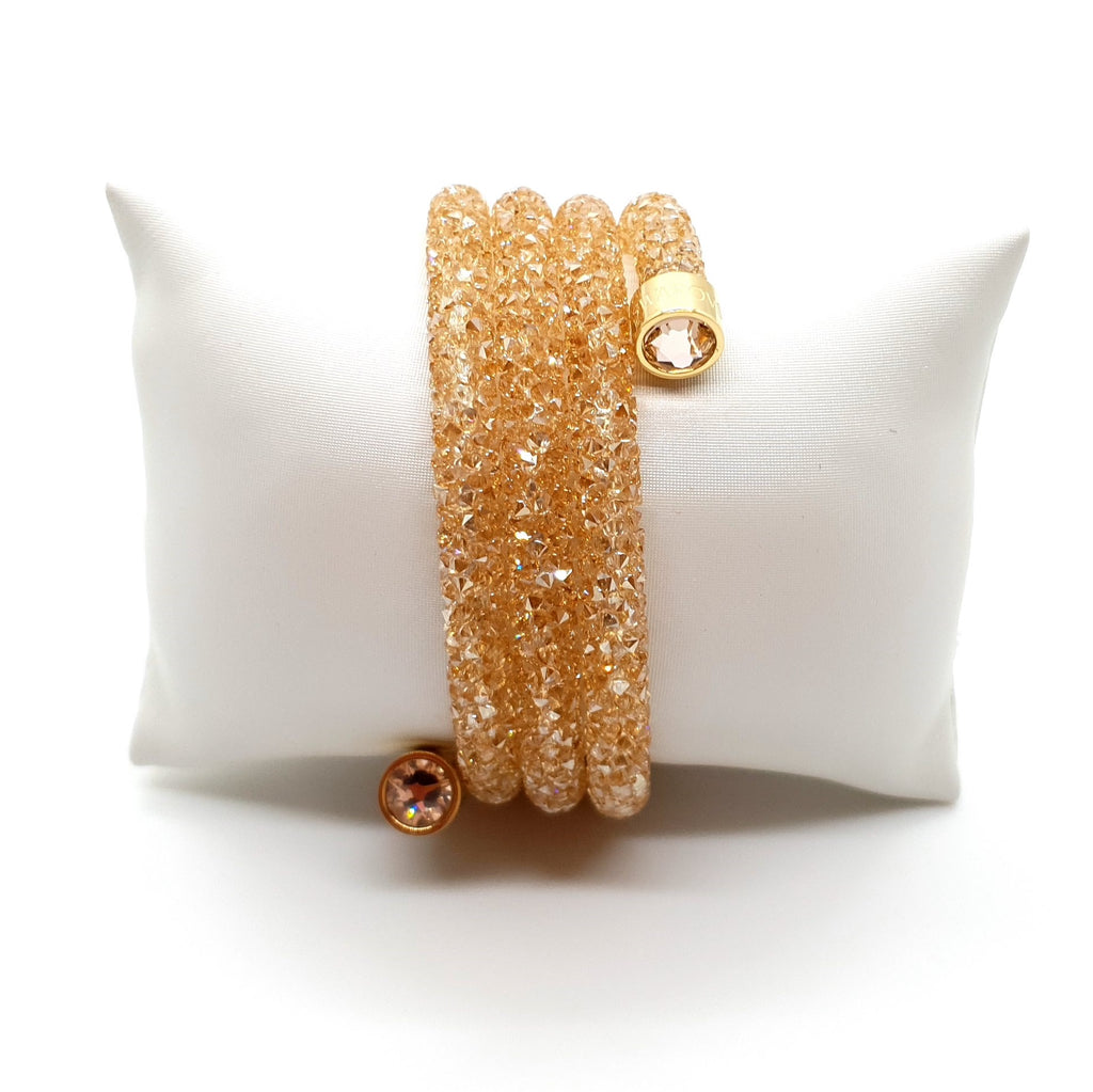 SWAROVSKI Crystaldust Triple Armreif Größe S Gold 5292446