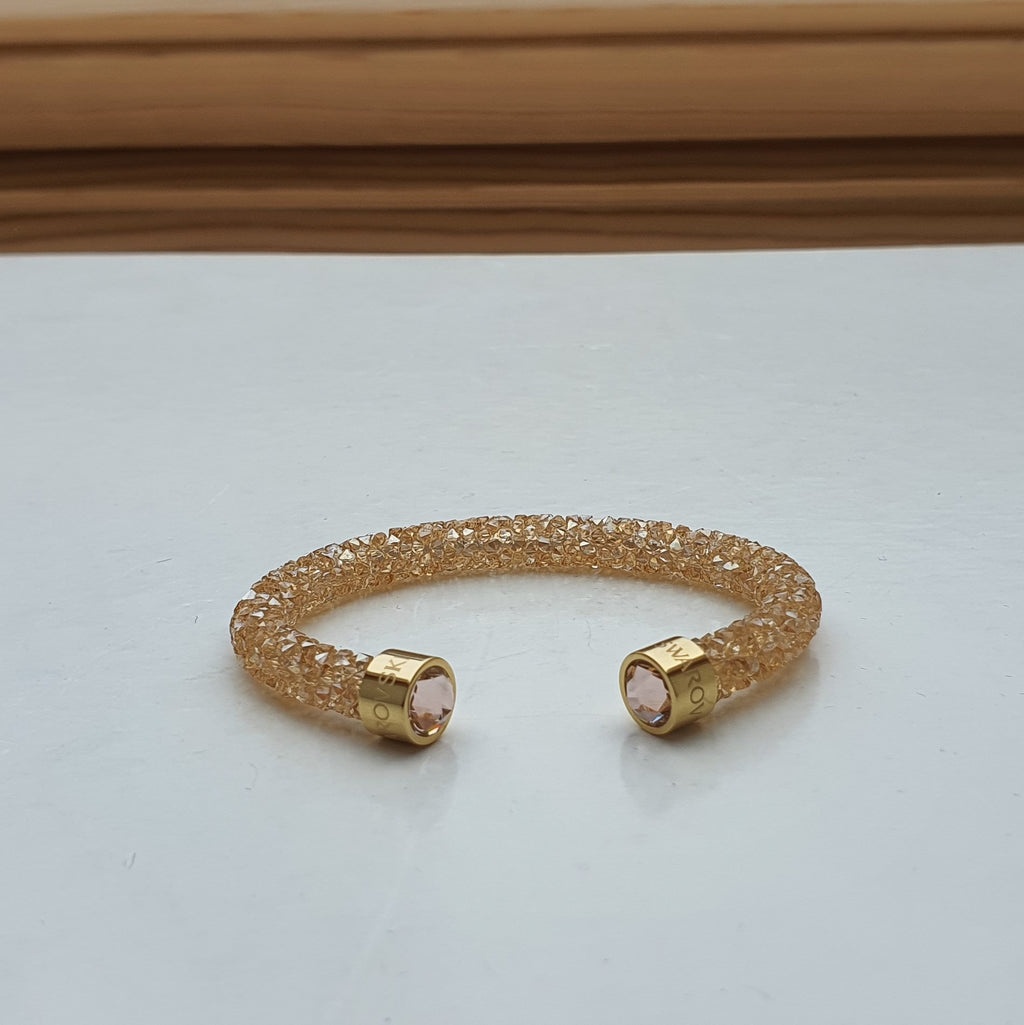SWAROVSKI Crystaldust Armreif Größe S Gold 5255897 oU