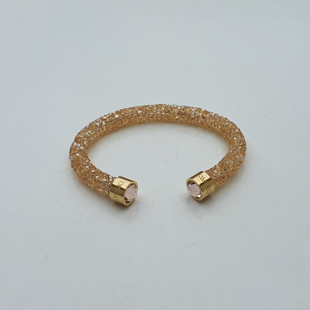 SWAROVSKI Crystaldust Armreif Größe S Gold 5255897 oU