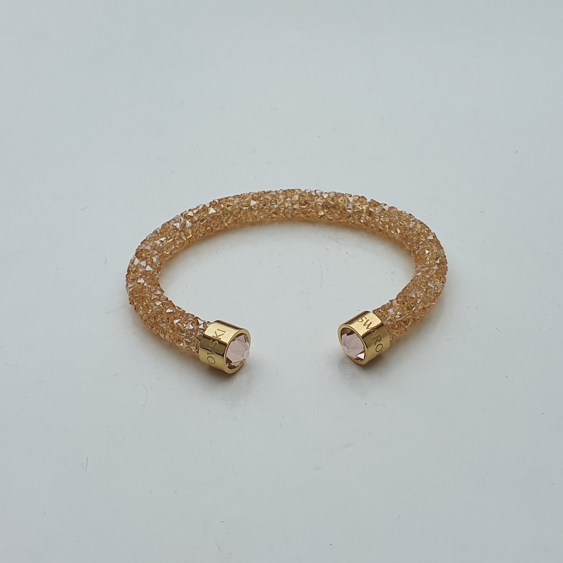 SWAROVSKI Crystaldust Armreif Größe S Gold 5255897 oU