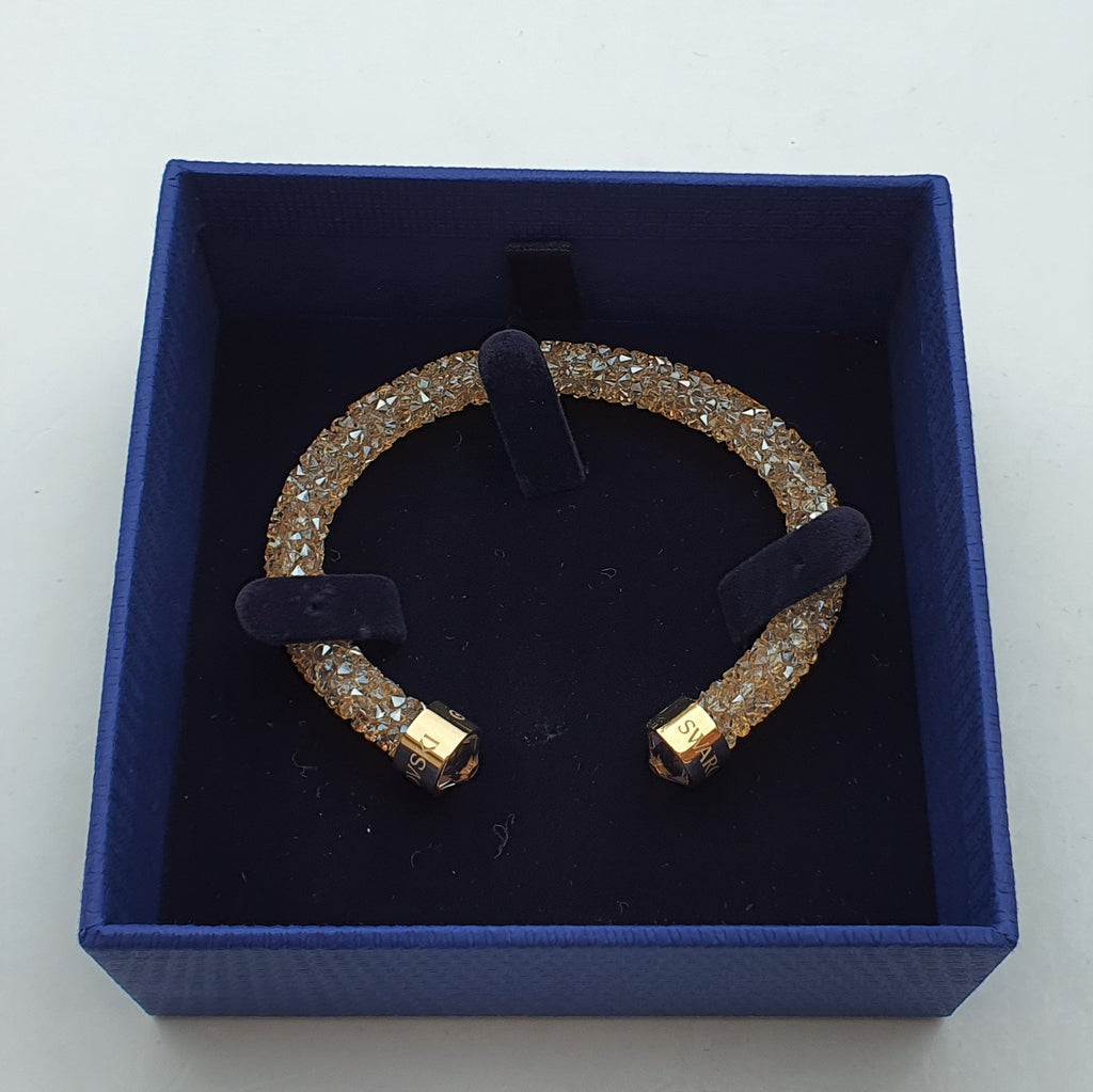 SWAROVSKI Crystaldust Armreif Größe M Gold 5250067 oU