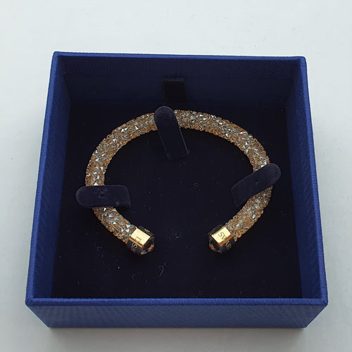 SWAROVSKI Crystaldust Armreif Größe M Gold 5250067 oU