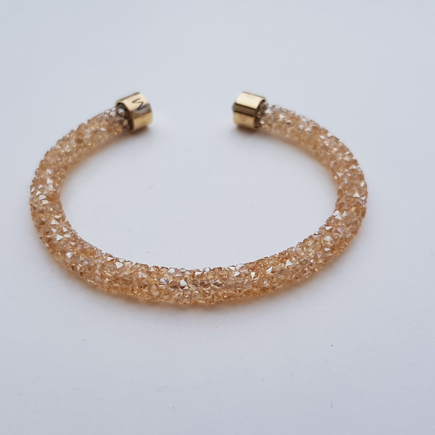 SWAROVSKI Crystaldust Armreif Größe M Gold 5250067 oU