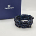 SWAROVSKI Crystaldust Triple Armreif Größe M Blau 5294804