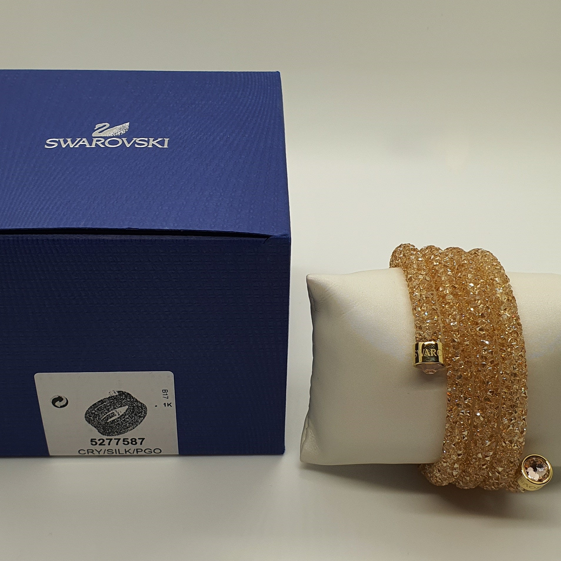 SWAROVSKI Crystaldust Triple Armreif Größe M Gold 5277587