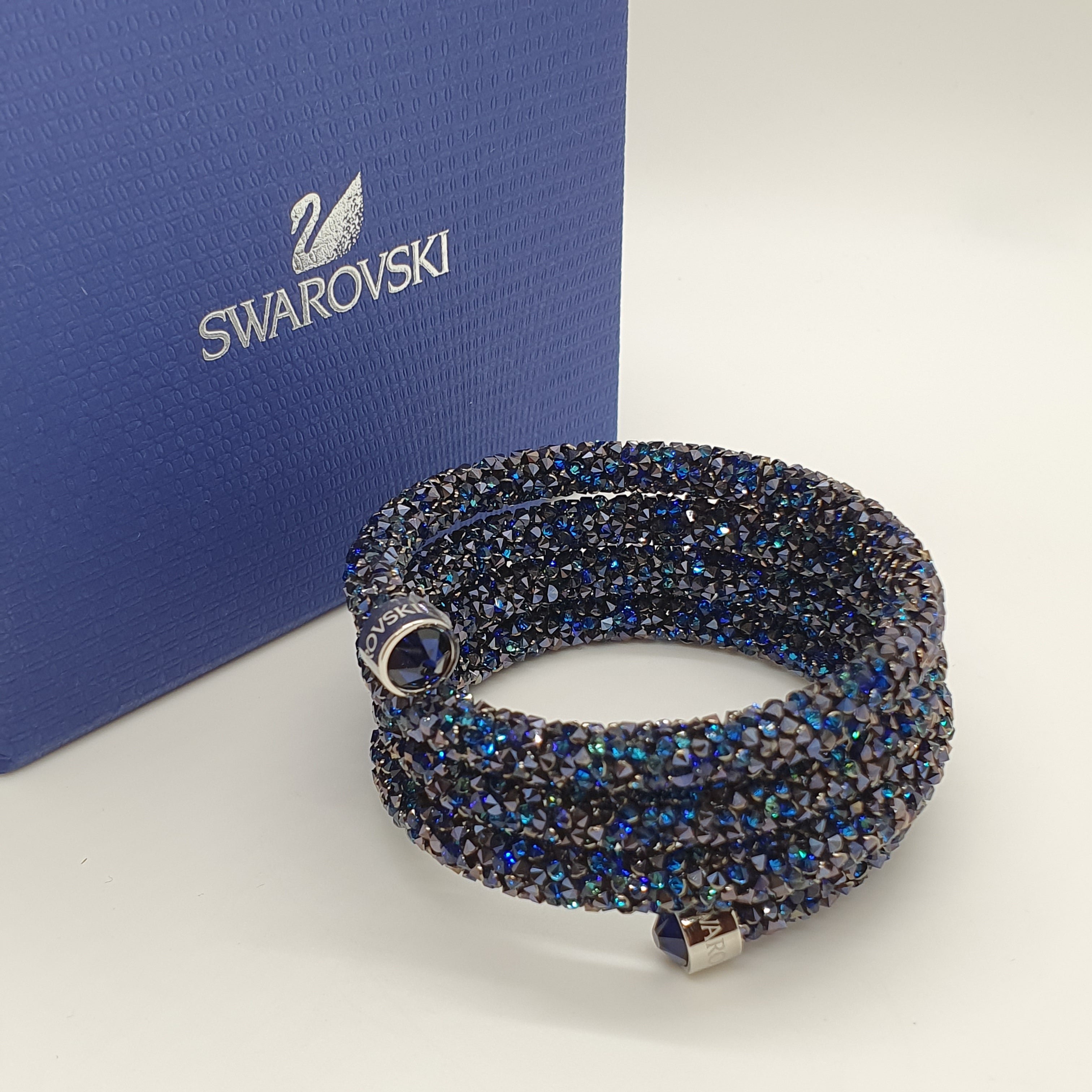 SWAROVSKI Crystaldust Triple Armreif Größe S Blau 5294928