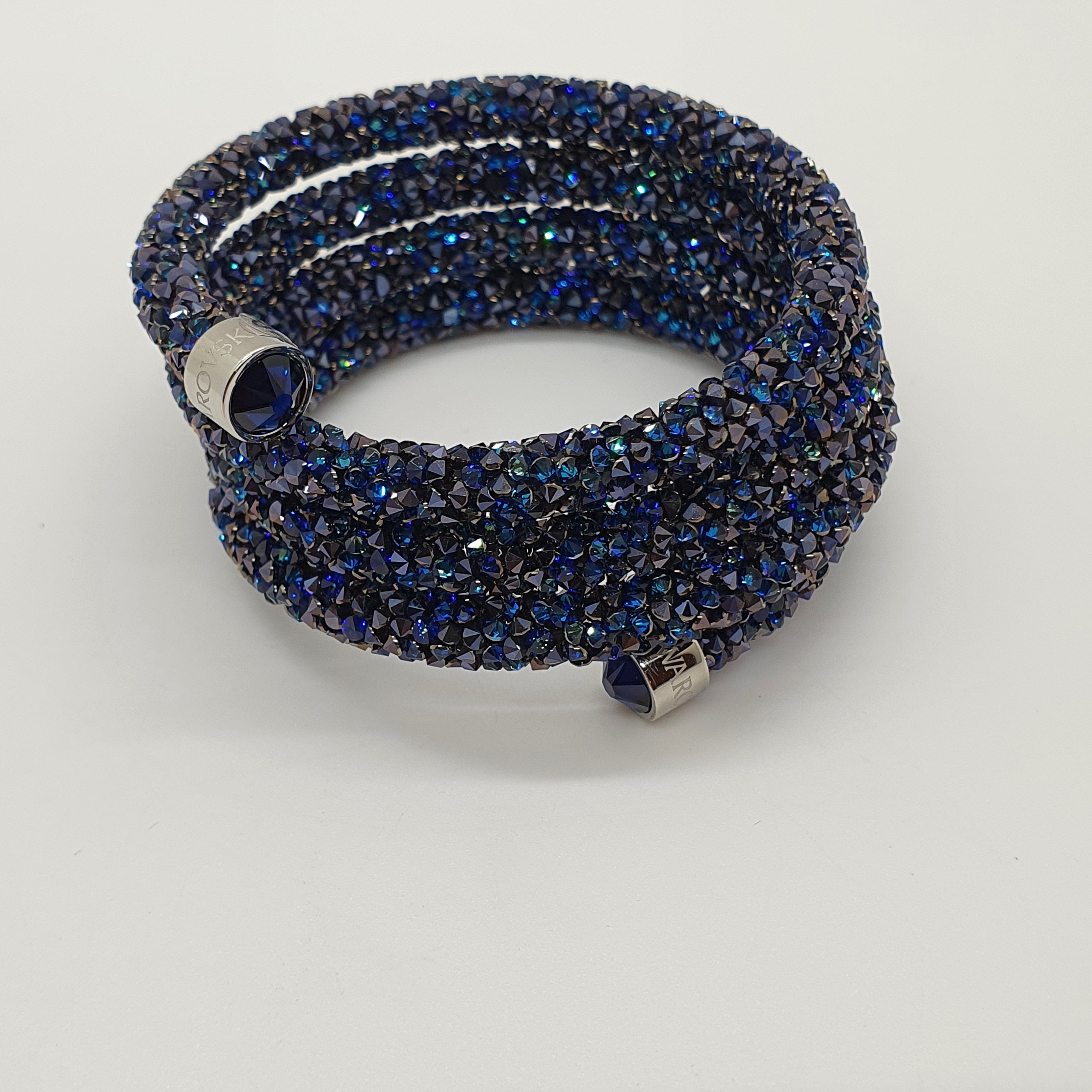 SWAROVSKI Crystaldust Triple Armreif Größe S Blau 5294928