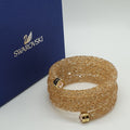 SWAROVSKI Crystaldust Triple Armreif Größe S Gold 5292446