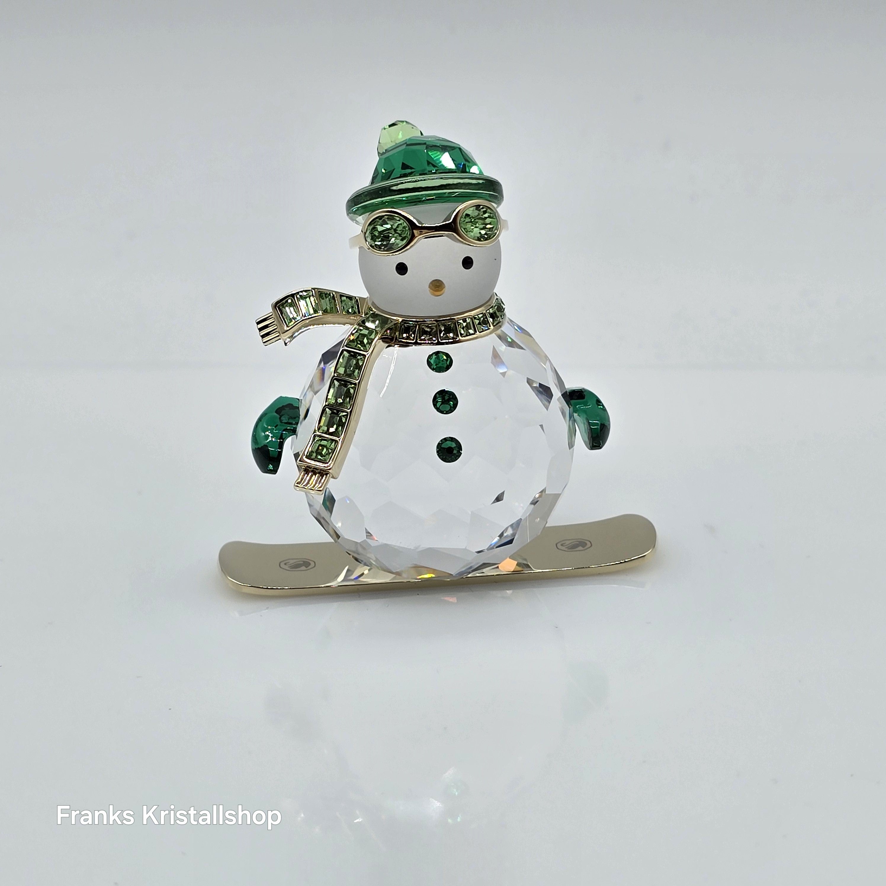 SWAROVSKI Holiday Cheers Dulcis Schneemann auf Snowboard Grün 5687168