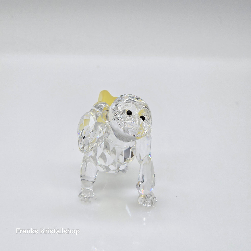 SWAROVSKI Junger Gorilla mit Bananen 273394