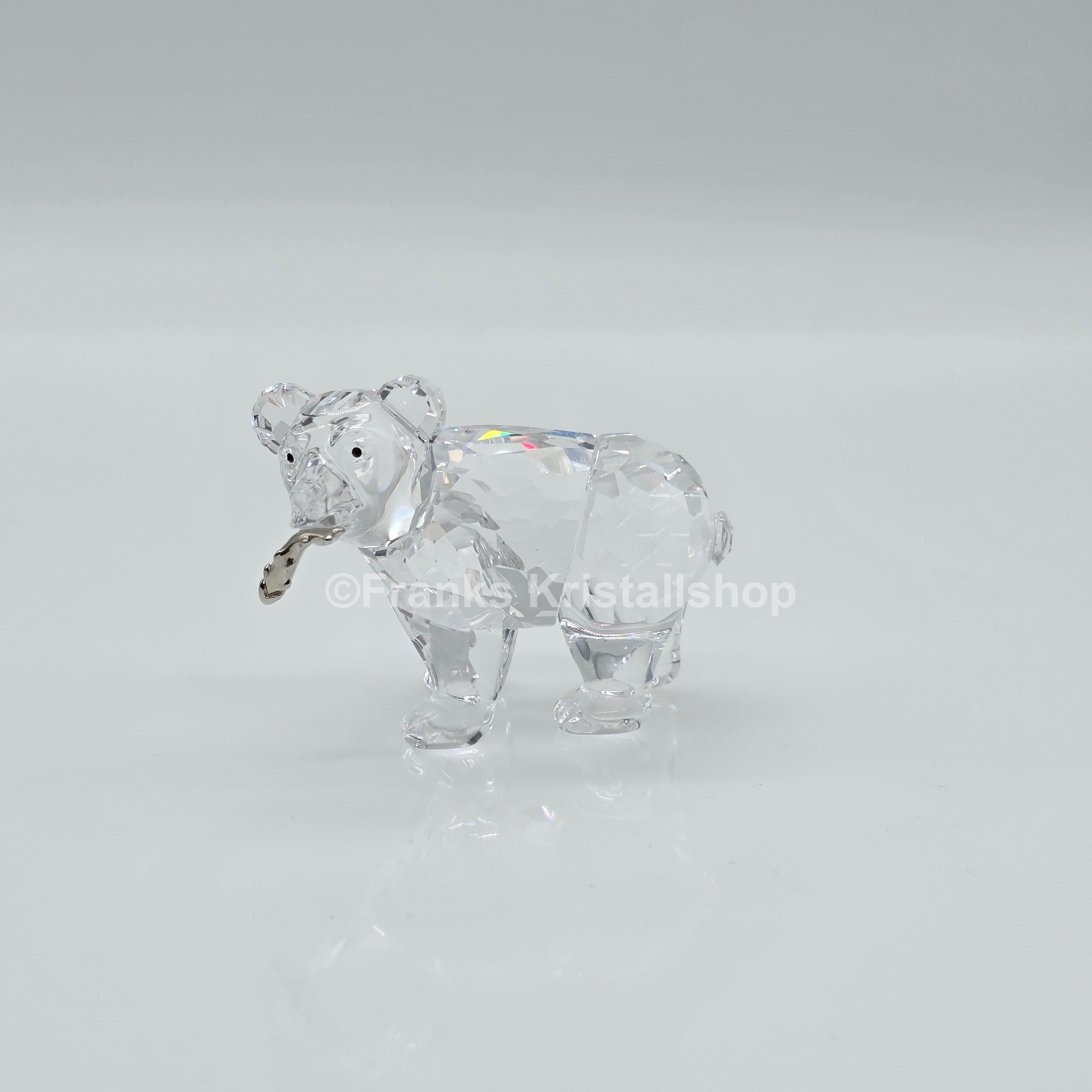 SWAROVSKI Junger Grizzly Bär mit Fisch 261925