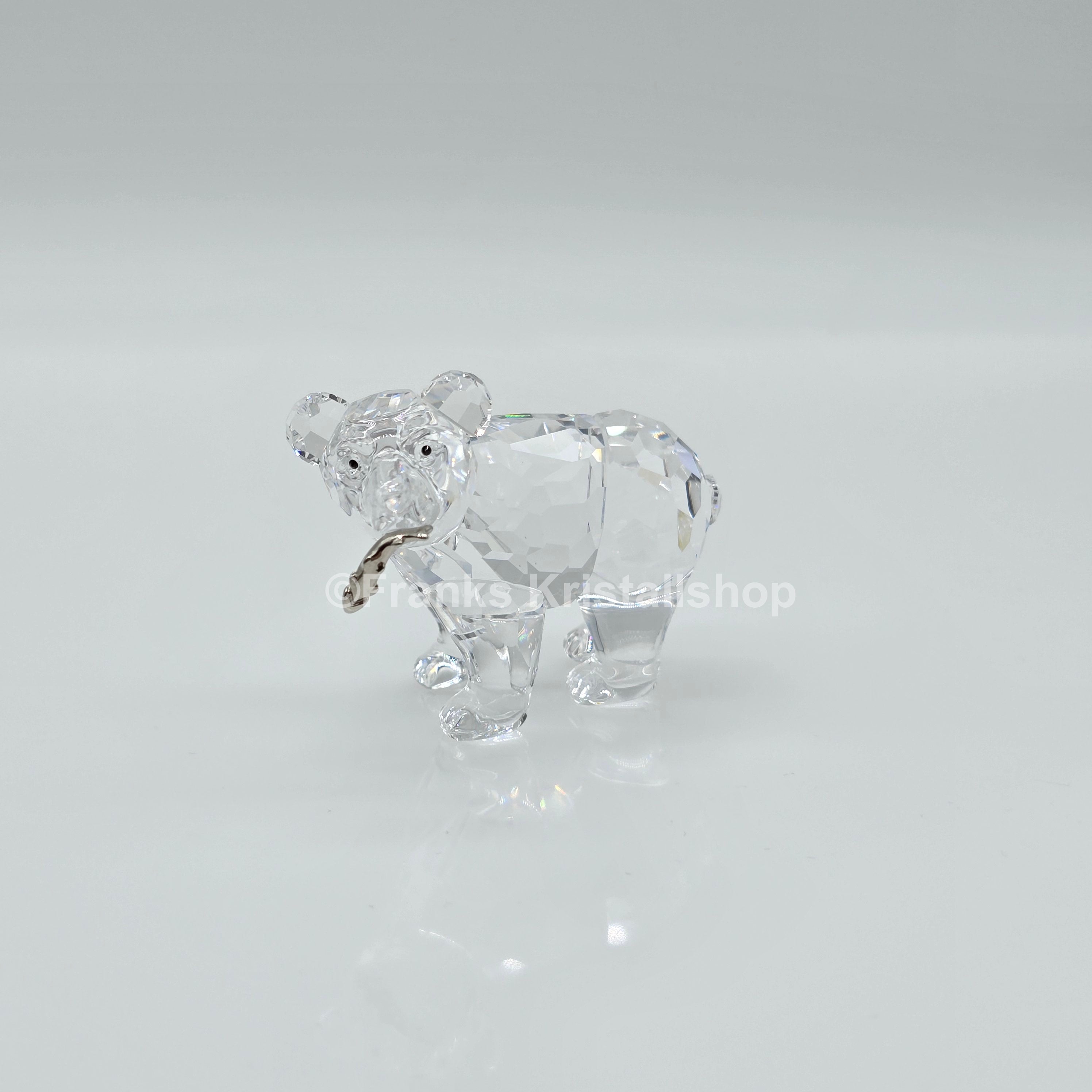 SWAROVSKI Junger Grizzly Bär mit Fisch 261925