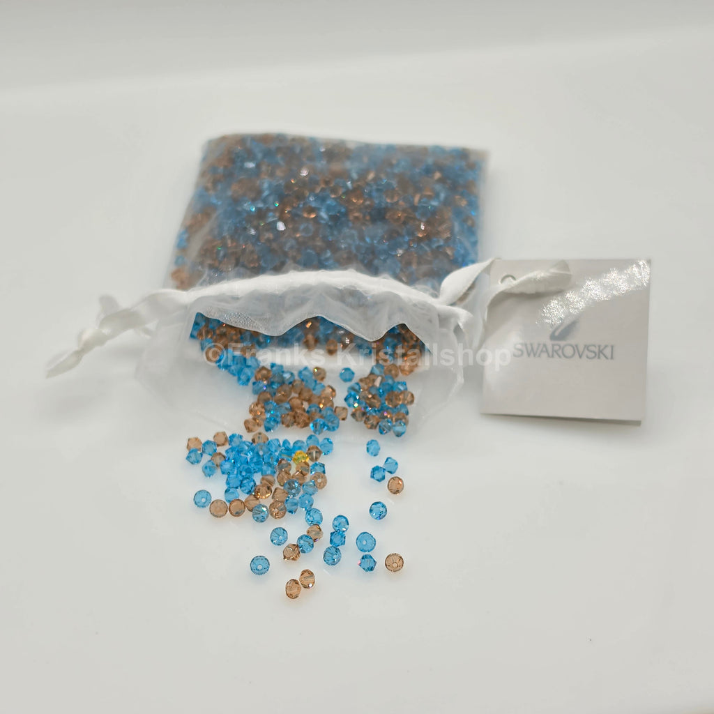 SWAROVSKI Kristall Dekosteine Doppelkegel Perlen 4 mm Blau-Braun