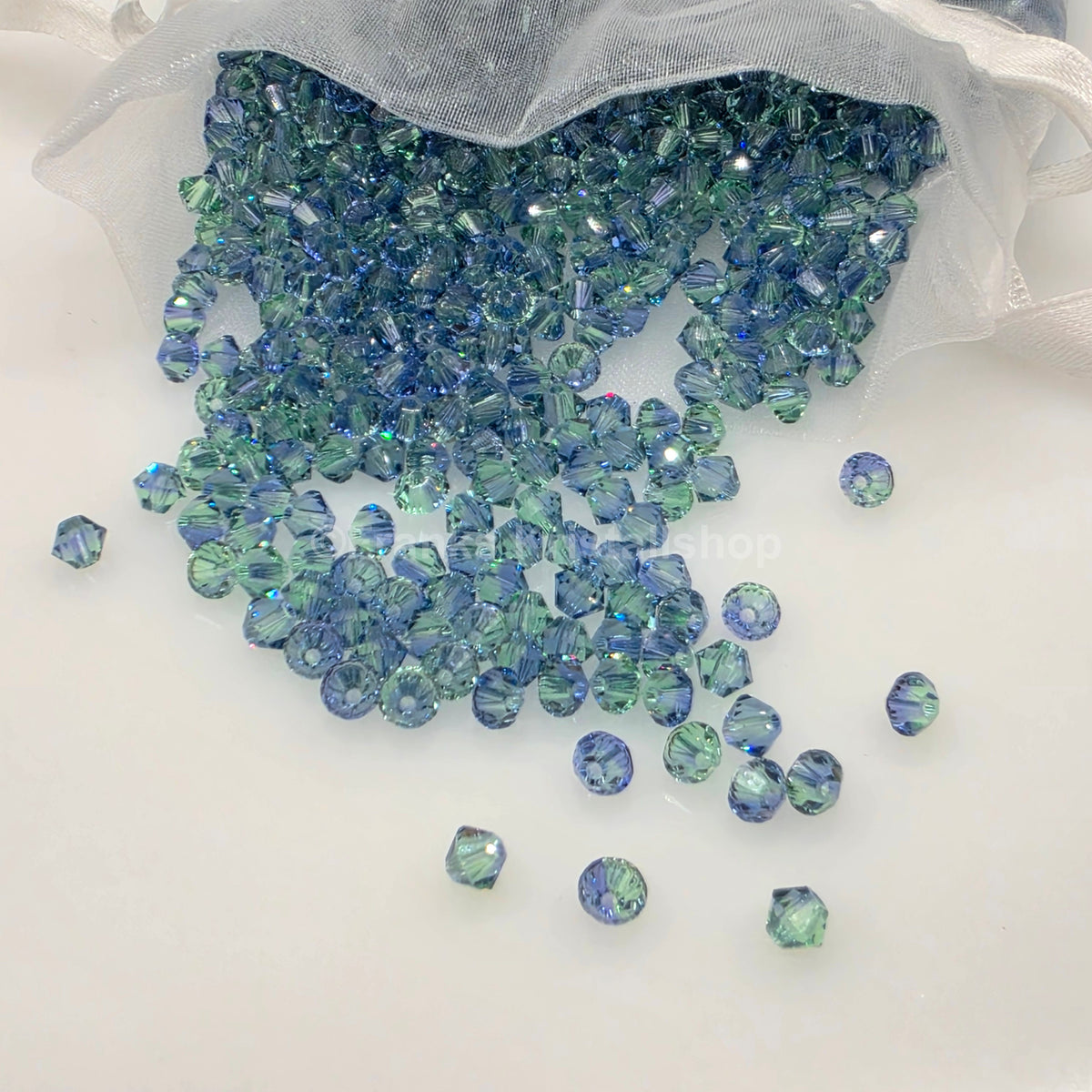 SWAROVSKI Kristall Dekosteine Doppelkegel Perlen 4 mm Blau-Grün