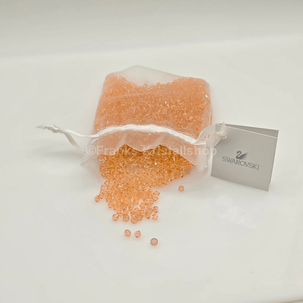 SWAROVSKI Kristall Dekosteine Doppelkegel Perlen 4 mm Peach