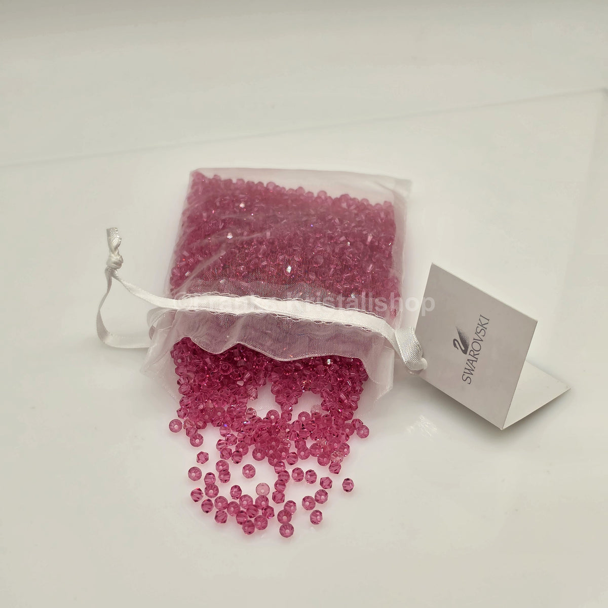 SWAROVSKI Kristall Dekosteine Doppelkegel Perlen 4 mm Rosa