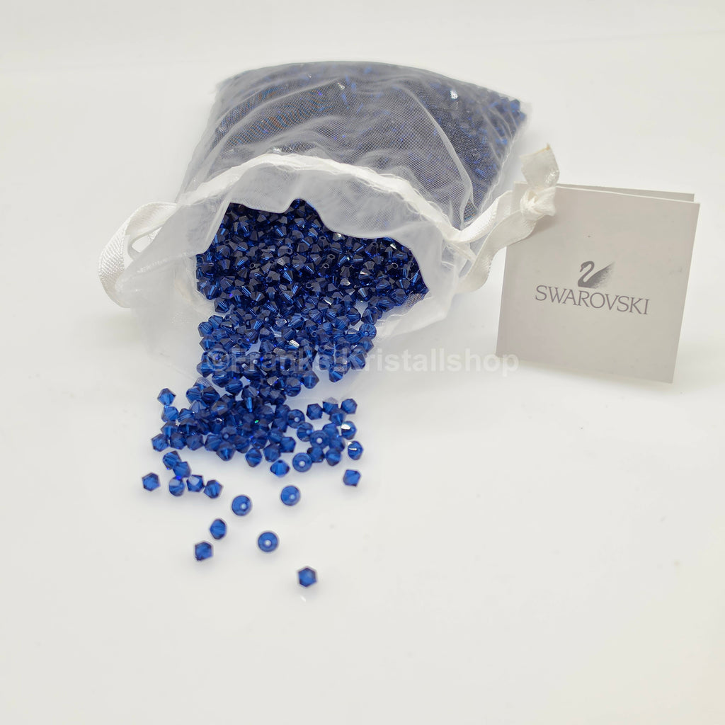SWAROVSKI Kristall Dekosteine Doppelkegel Perlen 4 mm Saphir Blau