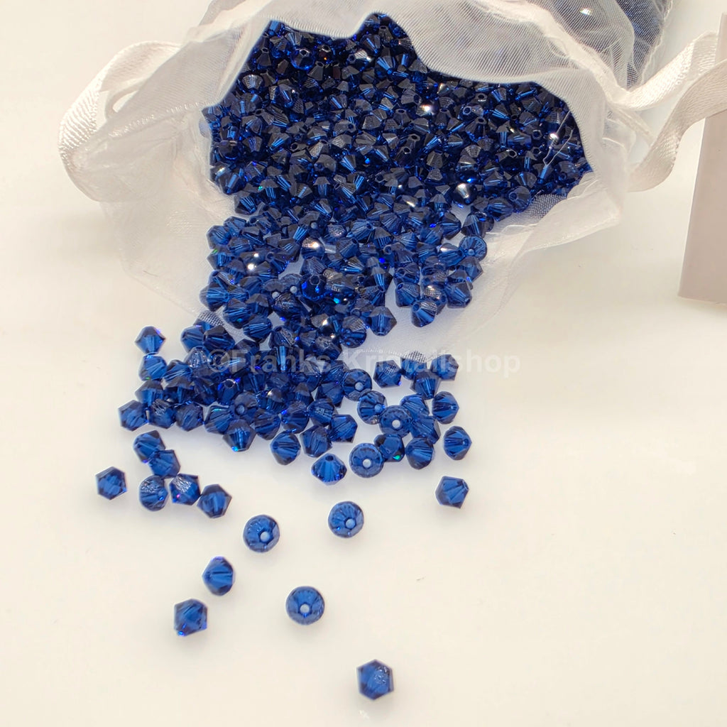 SWAROVSKI Kristall Dekosteine Doppelkegel Perlen 4 mm Saphir Blau