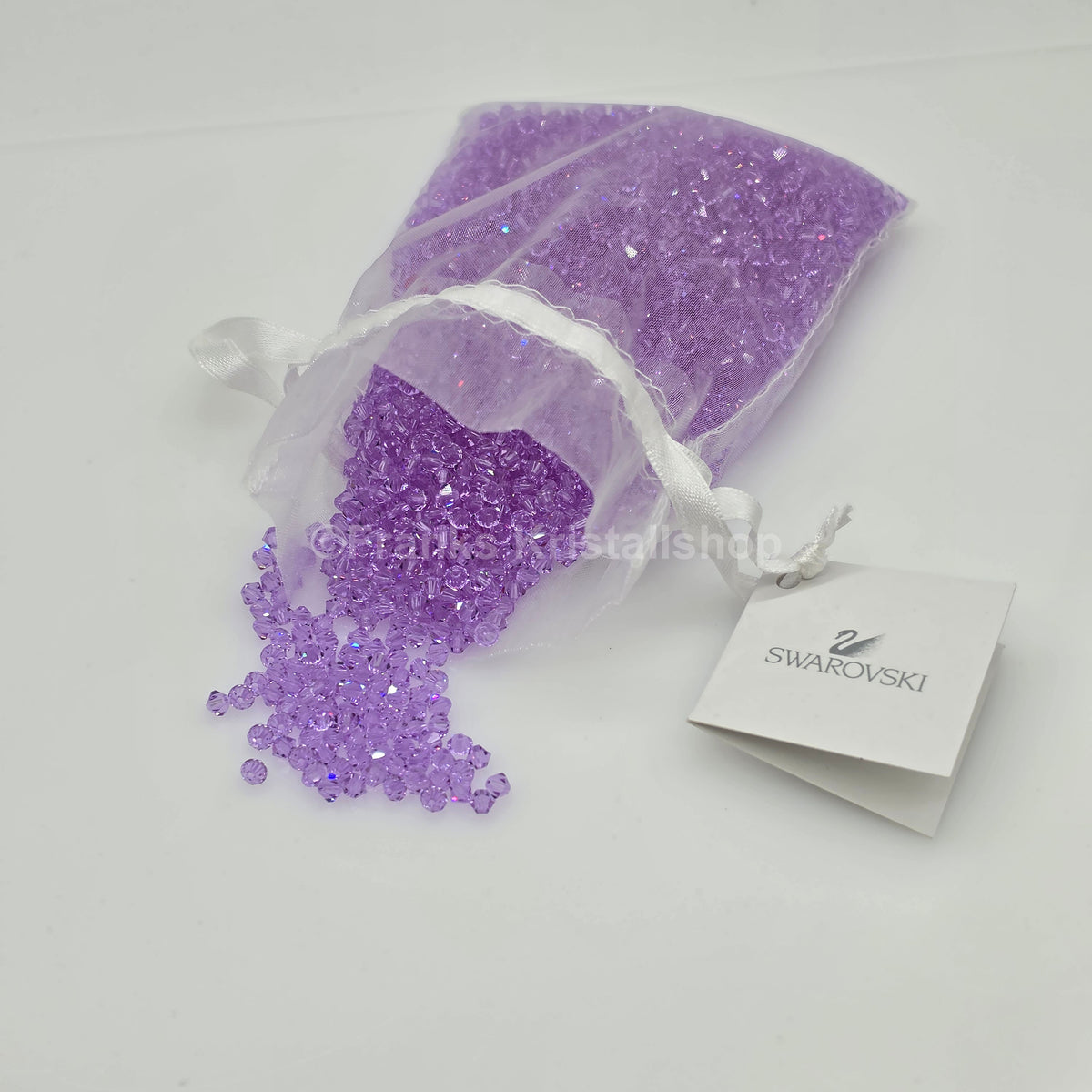 SWAROVSKI Kristall Dekosteine Doppelkegel Perlen 4 mm Violett