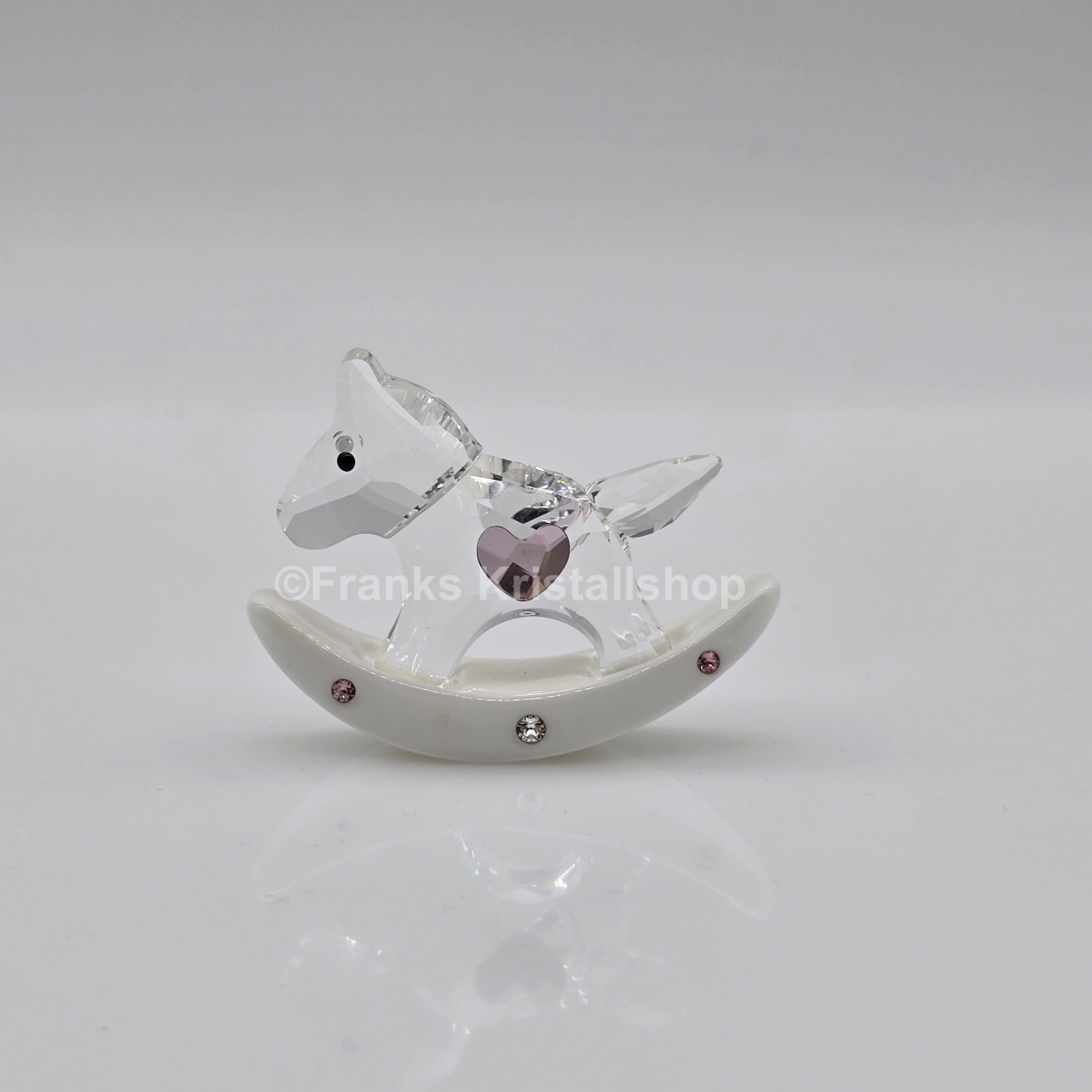 SWAROVSKI Memories Schaukelpferd Ein Mädchen Rosa 5136924