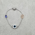 Swarovski Remix Evil Eye Armband Gr. M Violett Auge Rhodiniert 5365749