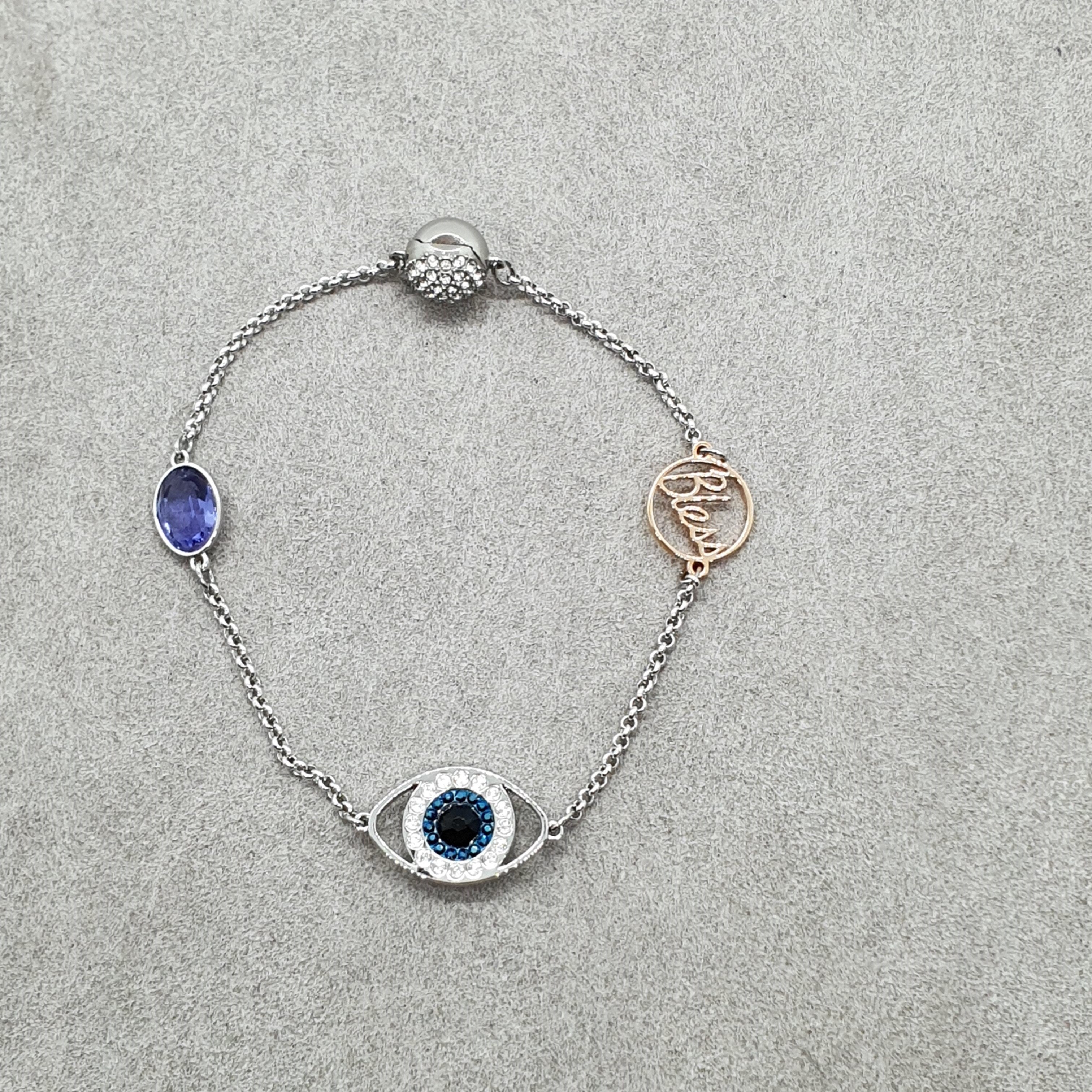 Swarovski Remix Evil Eye Armband Gr. M Violett Auge Rhodiniert 5365749