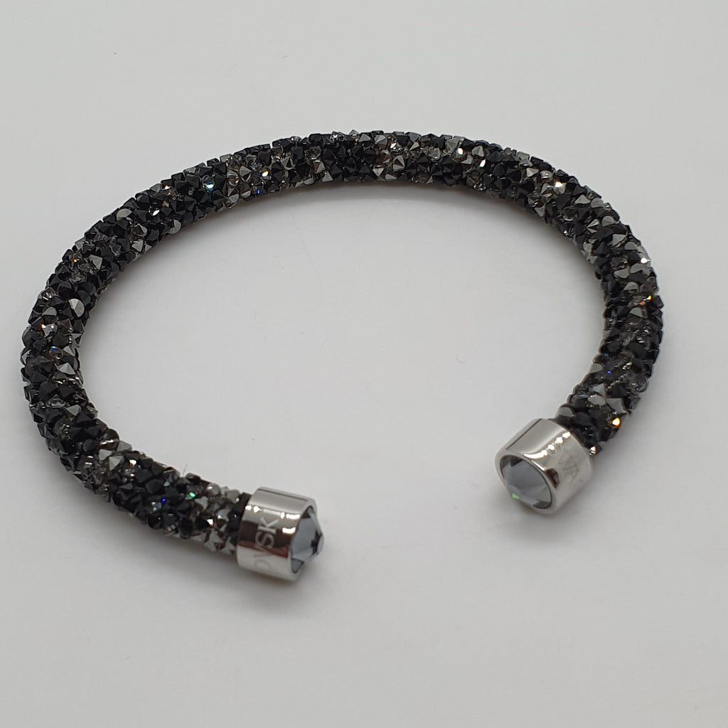 SWAROVSKI Crystaldust Armreif Größe S Schwarz Dunkelgrau 5255902 oU