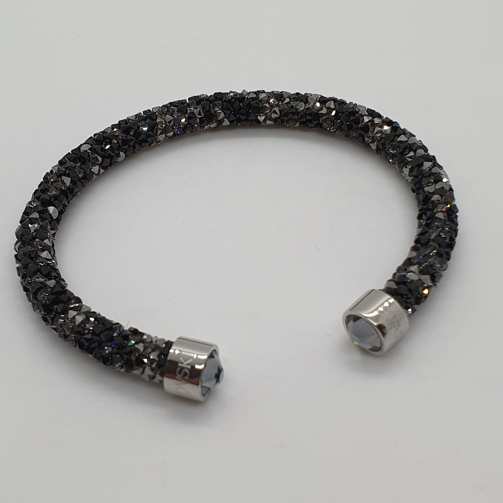 SWAROVSKI Crystaldust Armreif Größe M Schwarz Dunkelgrau 5250065 oU
