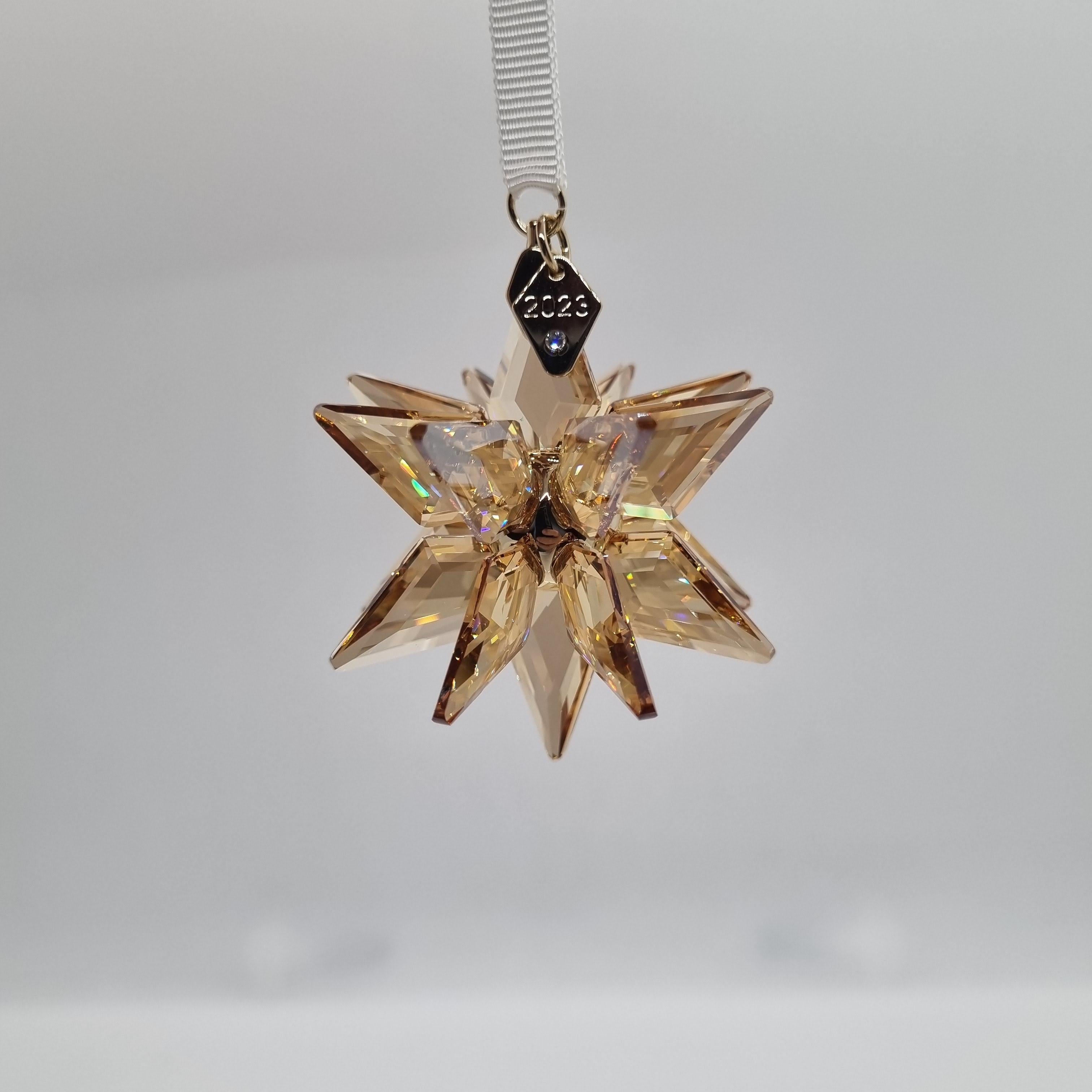 SWAROVSKI Weihnachtsstern 2023 3D Gold Festive 5653577
