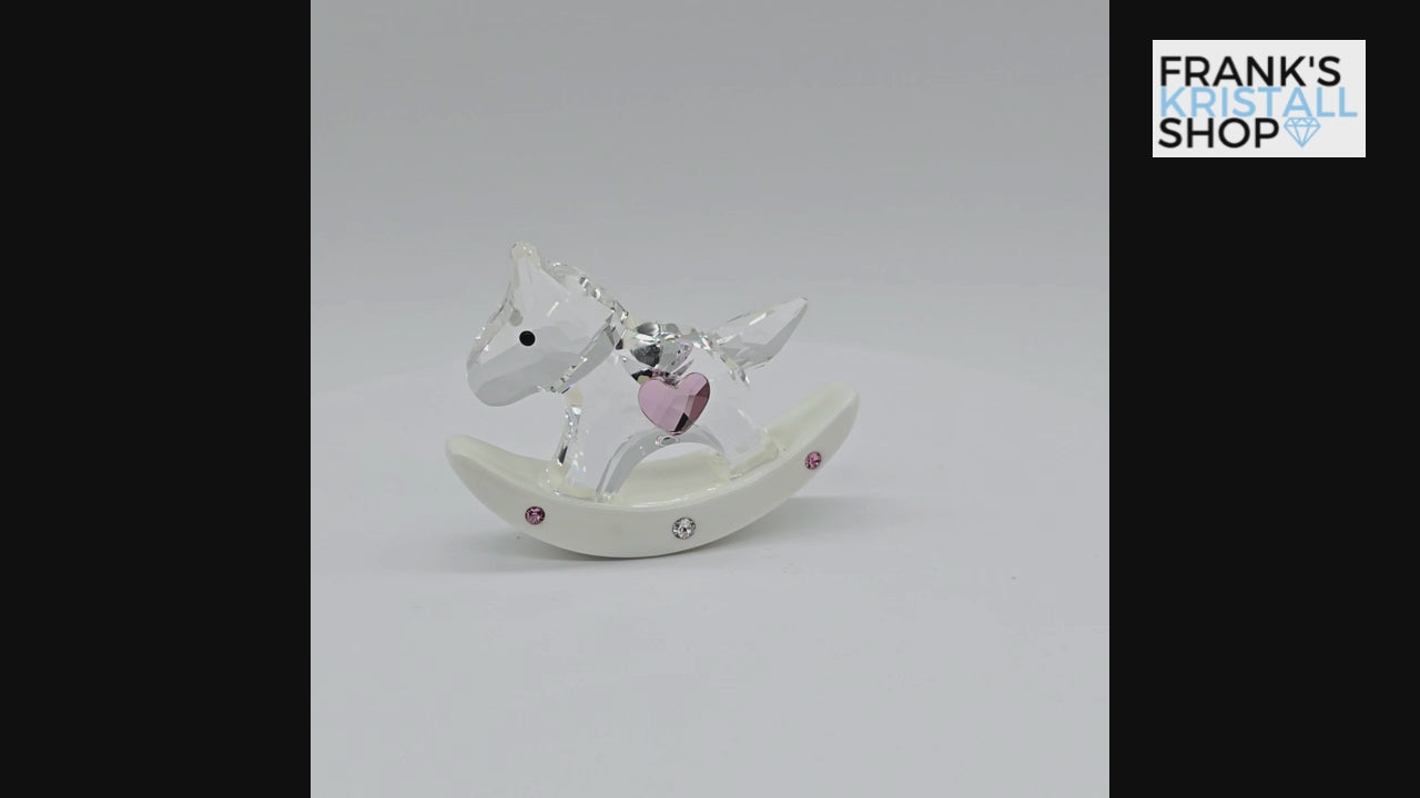 SWAROVSKI Memories Schaukelpferd Ein Mädchen Rosa 5136924