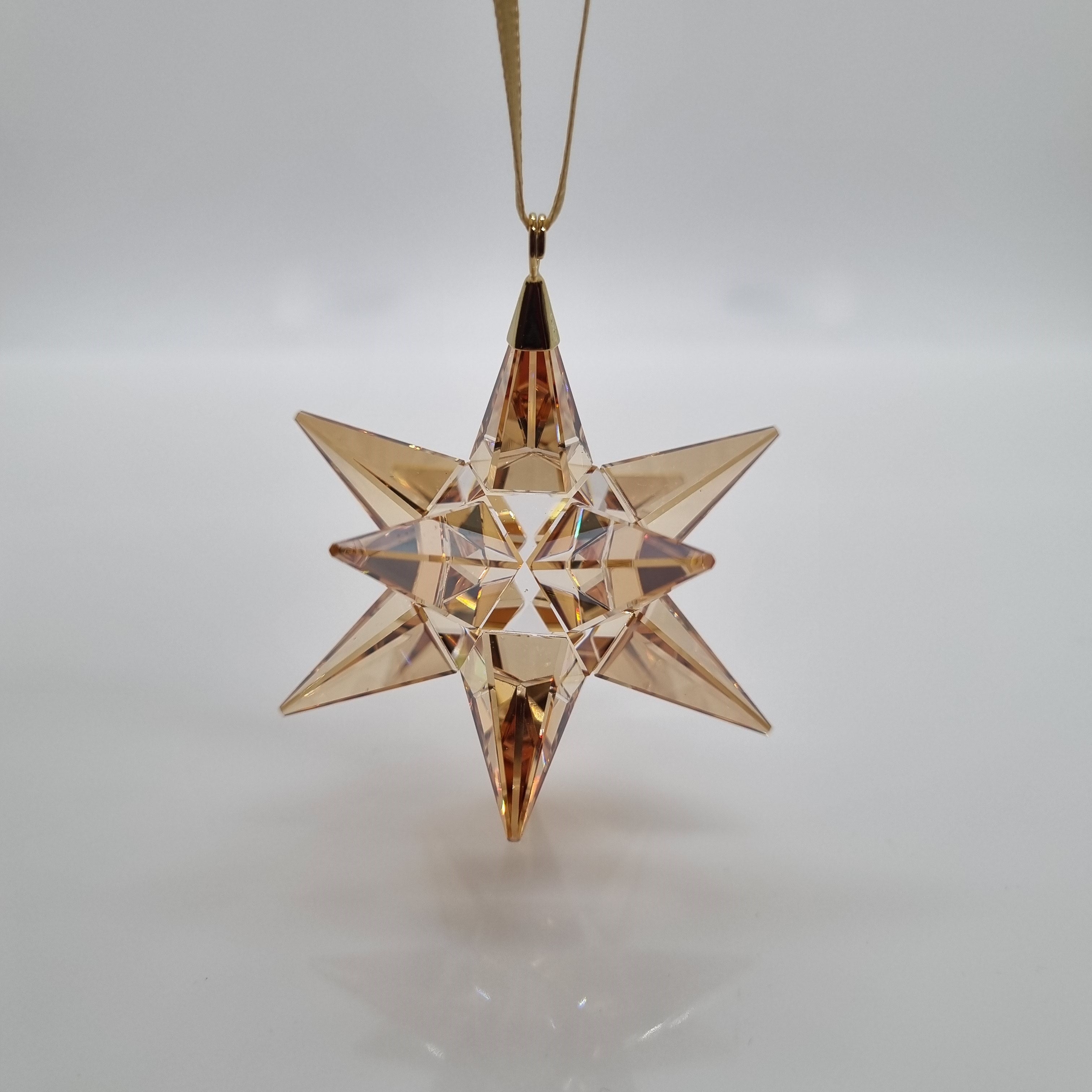 SWAROVSKI Weihnachtsstern Stern Ornament Gold Golden Shadow Mittel 5064260